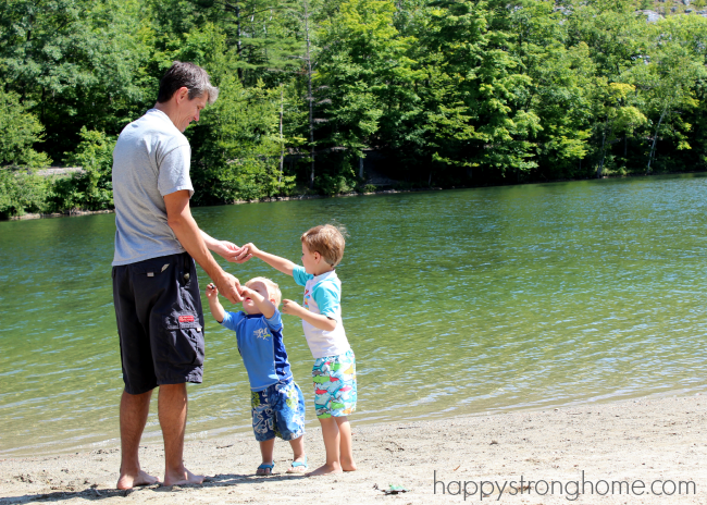 Boys throwing rocks Emerald Lake