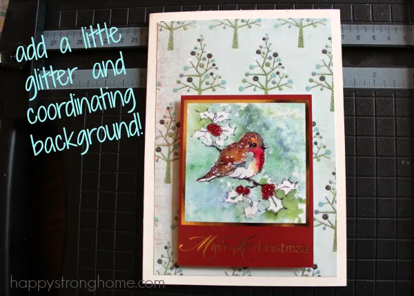 Bird card with added glitter and background card stock on mat