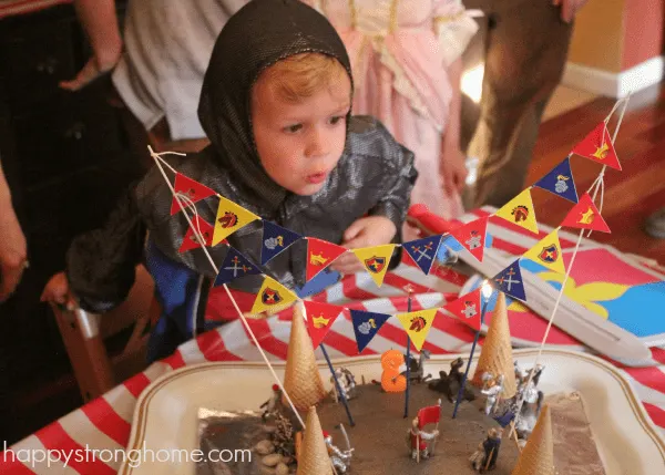 birthday-boy-blowing-candles-out