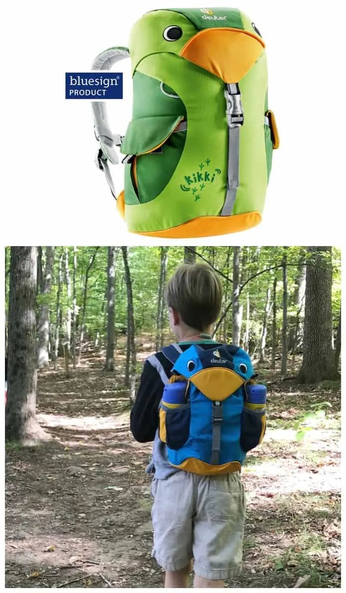 child wearing blue bird themed backpack