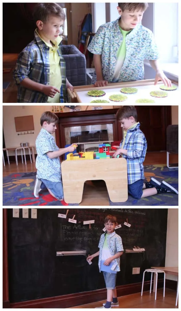 Two children sitting at a table, playin