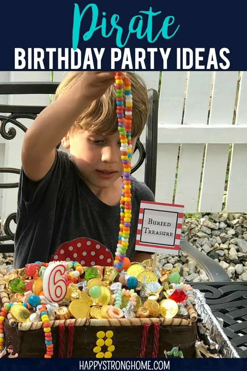 Kid with candy necklace at pirate birthday party