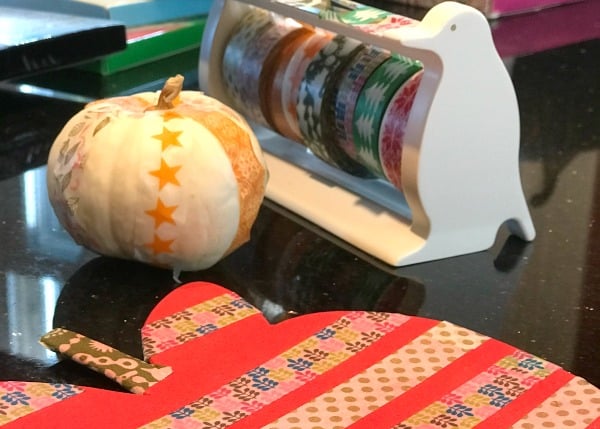 washi tape crafted items on a table