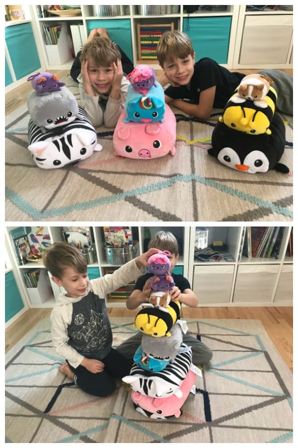 Kids play with stackable Moosh Moosh stuffed animals