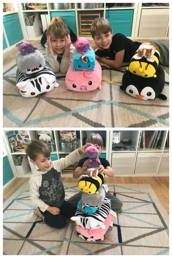 Kids play with stackable Moosh Moosh stuffed animals