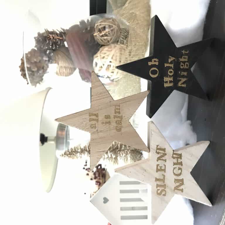 Wooden Star shapes stacked on top of each other on a table