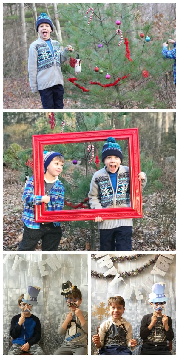 A group of kids outside posing for a Christmas photo holding a red frame