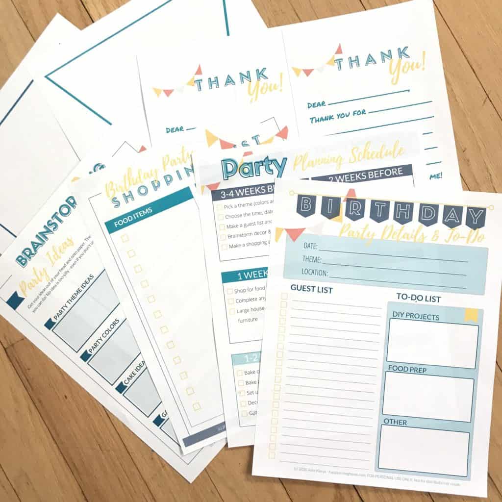 Flat lay of several pages of birthday party planning worksheets