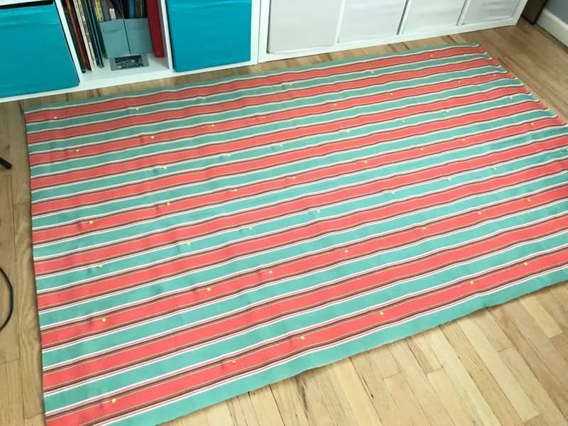 A close up of striped fabric to make a DIY Hammock Cover