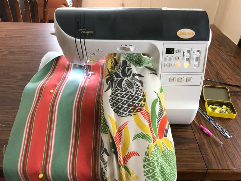 Sewing machine with striped fabric in machine