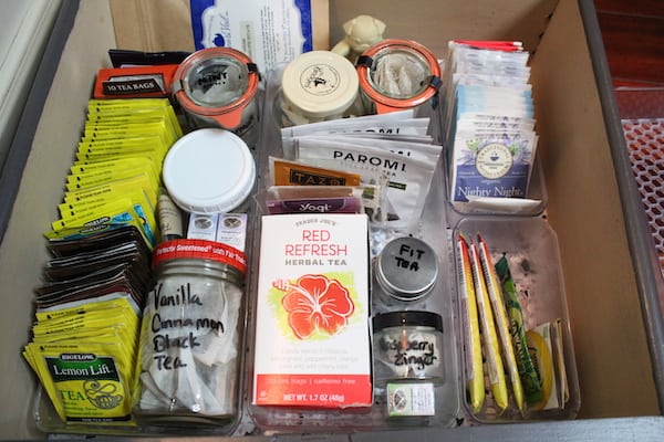 A bunch of items organized in a drawer