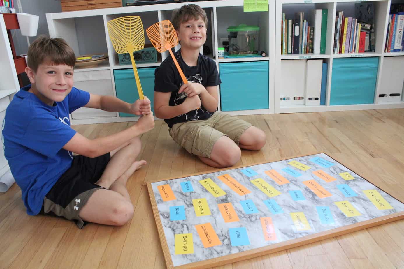 Kids play flyswatter game