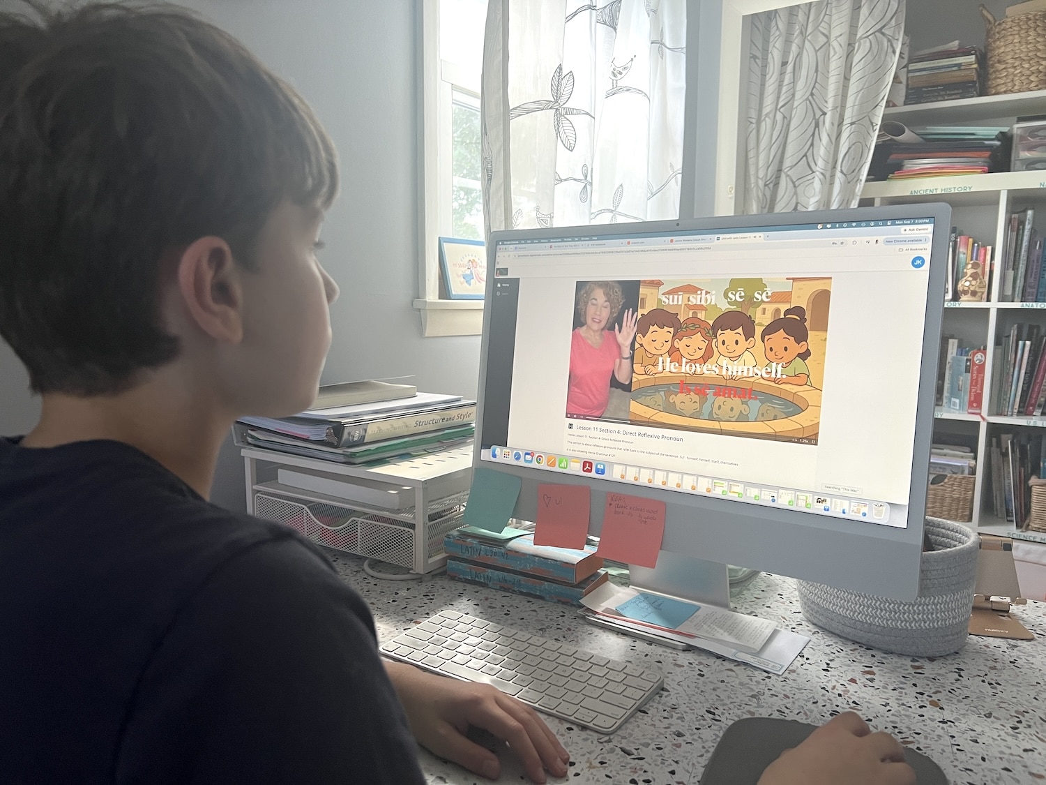 student watching video on computer screen